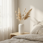 Minimalist bedroom styling with dried grasses